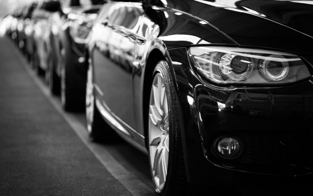 Line of black cars motor fleet insurance